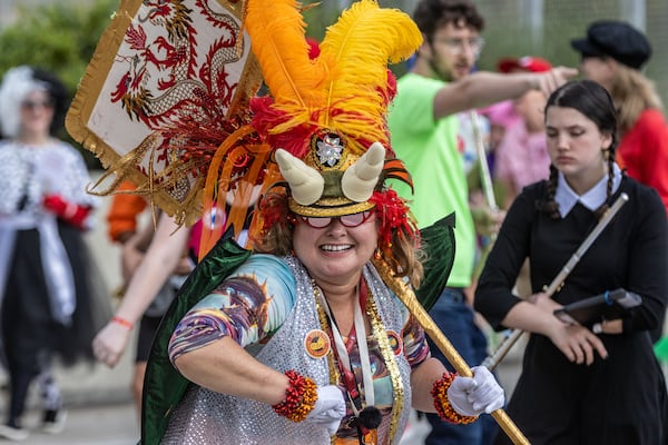 The Seed & Feed Marching Abominable heads up Peachtree Street during the 2022 Dragon Con Parade. Photo: Steve Schaefer/steve.schaefer@ajc.com)