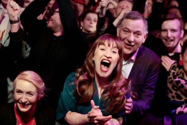 From left, Ines Schwerdtner, co-leader of the Left Party (Die Linke), top candidate Heidi Reichinnek and Jan van Aken, co-leader of the Left Party (Die Linke) react during the party's election party in Berlin, Germany, Sunday, Feb. 23, 2025. (Carsten Koall/dpa via AP)