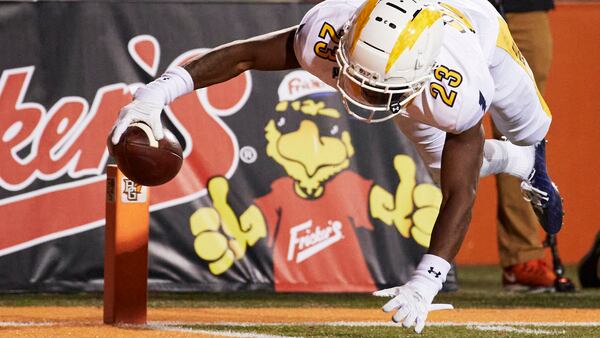 Kent State wide receiver Isaiah McKoy (23) dives for a touchdown against the Bowling Green Tuesday, Nov. 10, 2020 in Bowling Green, Ohio. (Rick Osentoski/AP)