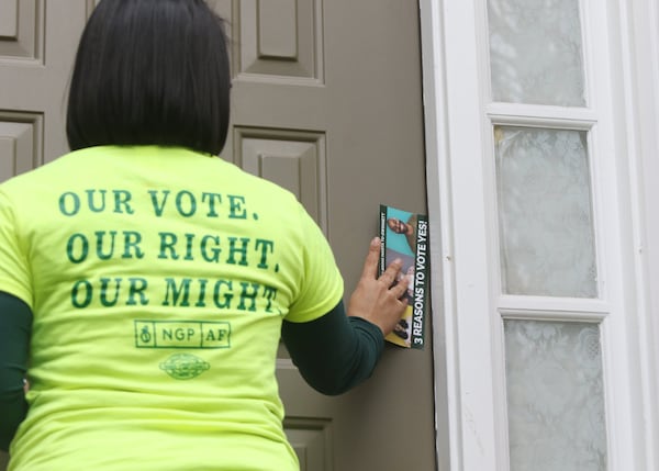 The New Georgia Project Action Fund, which supports Democrats, announced that it has launched a new field operation with the goal of knocking on 1 million doors ahead of the Dec. 6 U.S. runoff election. (Emily Haney/AJC)