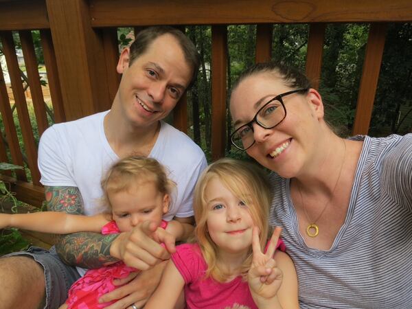 Osteria Mattone Executive Chef Eric Sell with his wife Lynn and daughters Ava (right) and Ellery. Ava takes gymnastics lessons, and the chef recently was able to watch her perform for the first time. Photo courtesy of Eric Sell