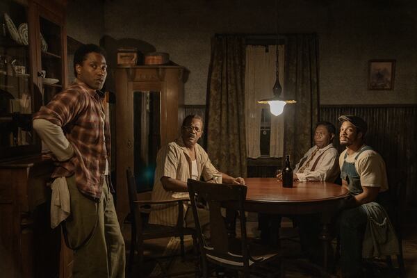 John David Washington as Boy Willie, Samuel L. Jackson as Doaker Charles, Michael Potts as Wining Boy and Ray Fisher as Lymon in "The Piano Lesson." Cr. David Lee/Netflix © 2024