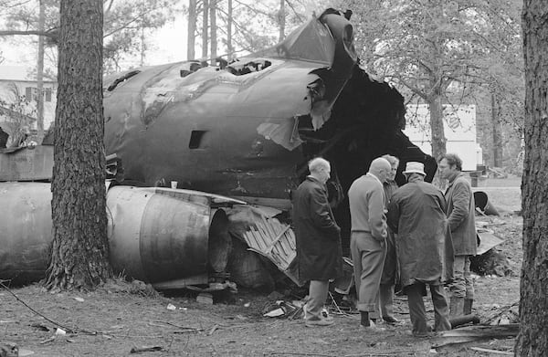 FILE - Federal Aviation Agency and National Transportation Safety Board officials began their investigation Tuesday, April 5, 1977 into the cause of the crash of a Southern Airways DC-9 in New Hope, Ga. (AP Photo)