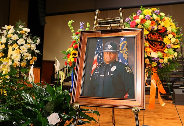 A portrait sits on the stage for the home-going service for Griffin police Officer Kevin “Shogun” Dorian Jordan, 43, at the Oak Hill Baptist Church on June 9, 2014. CURTIS COMPTON / CCOMPTON@AJC.COM