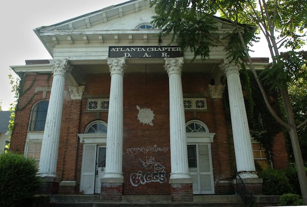 After a tree fell on the Craigie House in 1985, the building remained empty, attracting squatters and vandals with spray cans. The remnant of the former historic headquarters of the Atlanta Chapter of the Daughters of the American Revolution was bulldozed this week. File photo