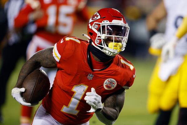 Kansas City Chiefs running back Jerick McKinnon (1) scores on a 4-yard touchdown reception during the first half of an NFL wild-card playoff football game against the Pittsburgh Steelers, Sunday, Jan. 16, 2022, in Kansas City, Mo. (AP Photo/Colin E. Braley)