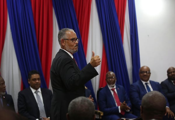 Haiti's new Prime Minister Alix Didier Fils-Aimé reacts after his inauguration ceremony in Port-au-Prince, Haiti, Monday, Nov. 11, 2024. (AP Photo/Odelyn Joseph)