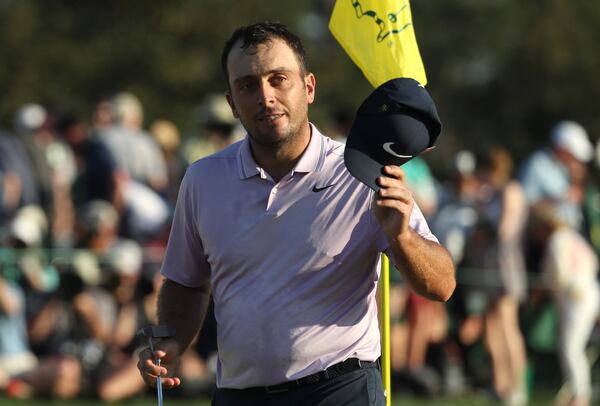 Francesco Molinari tips his hat after he finished the day 13 under for the lead during the third round of the Masters Tournament Saturday, April 13, 2019, at Augusta National Golf Club in Augusta. (JASON GETZ/SPECIAL TO THE AJC)