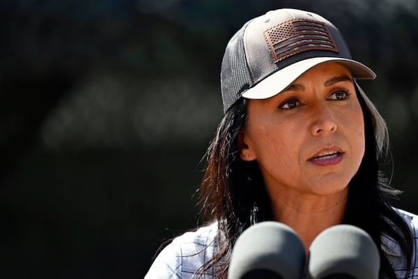 Director of National Intelligence Tulsi Gabbard speaks to reporters during a visit to the U.S. border with Mexico Wednesday, March 5, 2025 in Eagle Pass, Texas, with Vice President JD Vance. (Brandon Bell/Pool via AP)