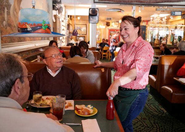 Waitress Angela Wooster talks to diners, Al Russell, 79, of El Granada, facing camera, and Russell's friend, at Buck's restaurant Thursday, March 30, 2017, in Woodside, Calif. (Jim Gensheimer/Bay Area News Group/TNS)