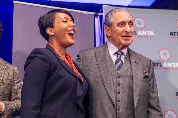 01/28/2019 -- Atlanta, Georgia -- Atlanta Mayor Keisha Lance Bottoms laughs while speaking with Atlanta Falcons owner Arthur M. Blank following a 'Welcome to Super Bowl LIII' press conference at the Georgia World Congress Center in Atlanta, Monday, January 28, 2019. (ALYSSA POINTER/ALYSSA.POINTER@AJC.COM)