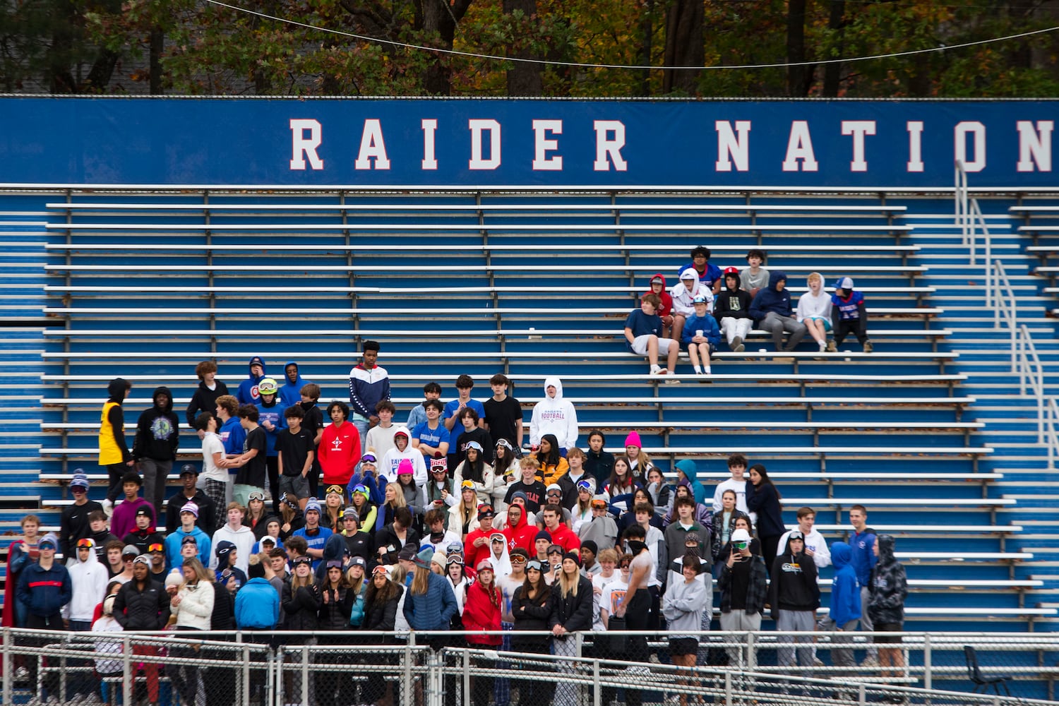 Members of the Walton student body cheer in the stands. CHRISTINA MATACOTTA FOR THE ATLANTA JOURNAL-CONSTITUTION.