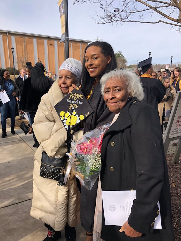 Juanita Poitier, Guylaine Gouraige and Frances Jean Walker pose for photos at Gouraige's graduation from Kennesaw State University in 2018.