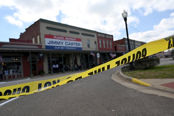 Police line blocked off downtown Plains as beautification efforts began, Wednesday, Feb. 22, 2023, in Plains, GA. (Hyosub Shin / Hyosub.Shin@ajc.com)