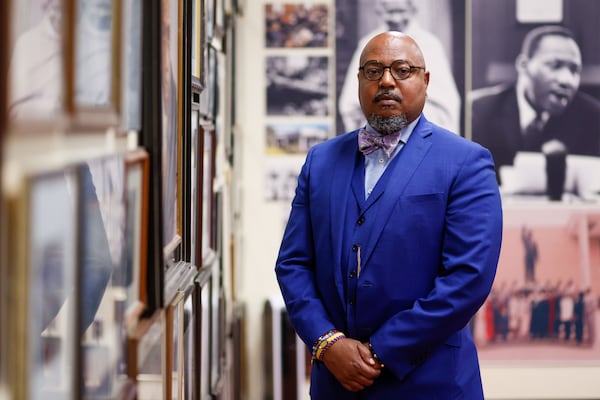 IIIya E. Davis, Dean of freshmen and senior students at Morehouse College's dean of Freshmen and Seniors’ Academic Success, poses for a photograph at Martin Luther King Jr. International Chapel on campus on Wednesday, April 24, 2024. (Miguel Martinez / AJC)