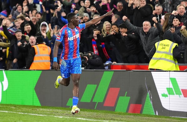 Crystal Palace's Ismaila Sarr celebrates scoring their side's first goal of the game during the English Premier League soccer match between Crystal Palace and Aston Villa at Selhurst Park, London, Tuesday, Feb. 25, 2025. (Zac Goodwin/PA via AP)