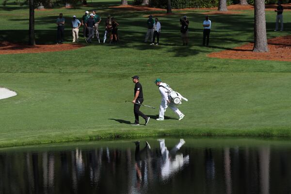 Bryson DeChambeau walks to the 16th green during the first round of the Masters Tournament Thursday, Nov. 12, 2020, at Augusta National. This year's tournament is being played without spectators due to the coronavirus pandemic. (Curtis Compton / Curtis.Compton@ajc.com)