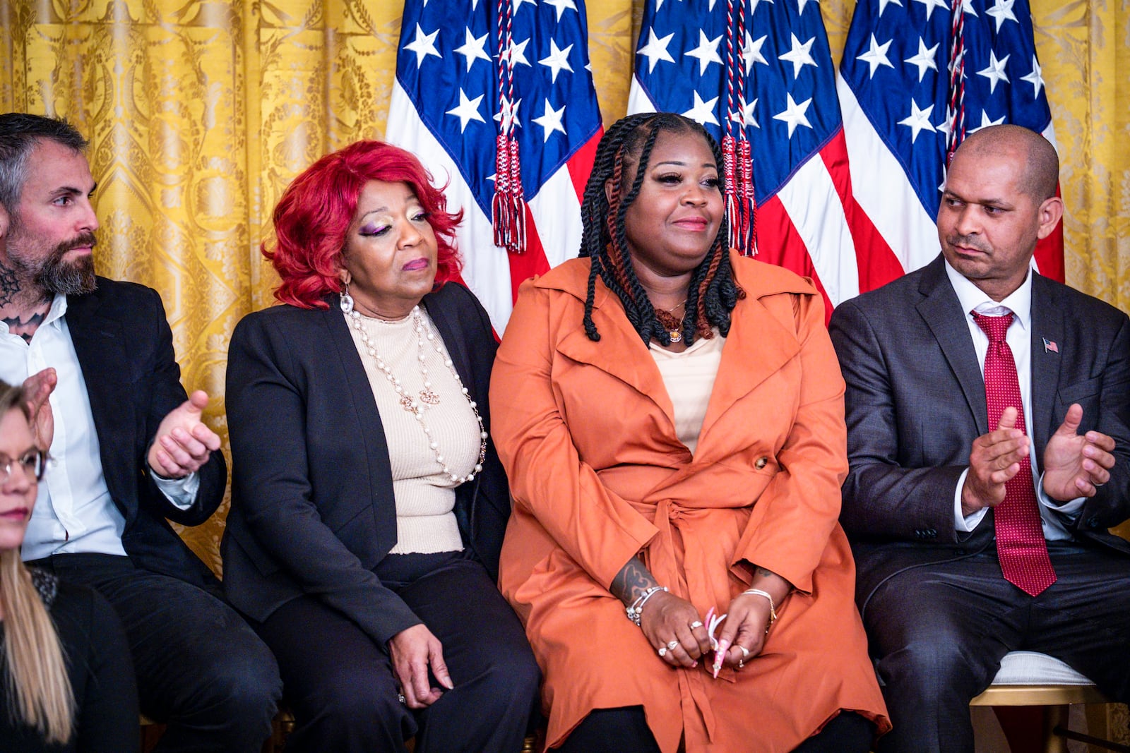 Election workers Ruby Freeman (left) and Shaye Moss during a 2023 White House event commemorating the second anniversary of the attack on the U.S. Capitol.
                      