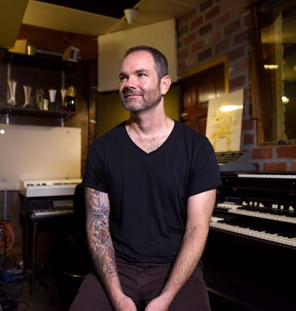 Brandon Bush in his Decatur studio. Photo: Ryon Horne/RHORNE@AJC.COM