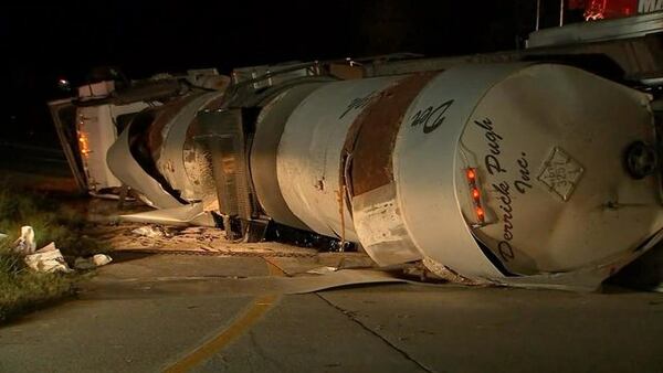 A tractor-trailer overturned and gallons of tar spilled on a ramp to I-75 South in Bartow County. (Credit: Channel 2 Action News)