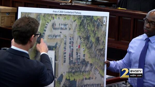 Defense attorney Carlos Rodriguez (left) asks Aundrae Brown, a coworker of Justin Ross Harris, where employees at Home Depot preferred to park their cars at the Treehouse parking lot, during Harris' murder trial at the Glynn County Courthouse in Brunswick, Ga., on Tuesday, Nov. 1, 2016. (screen capture via WSB-TV)