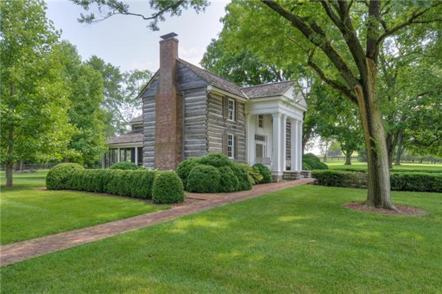 753-acre property includes Antebellum home, log cabin