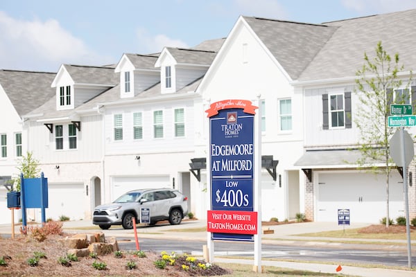 A sign shows the price of the new homes available at Edgemoore at Milford in Marietta on Sunday, April 30, 2023. The peak month for home sales in metro Atlanta in 2023 was in May, and 7,247 homes were sold.
Miguel Martinez /miguel.martinezjimenez@ajc.com