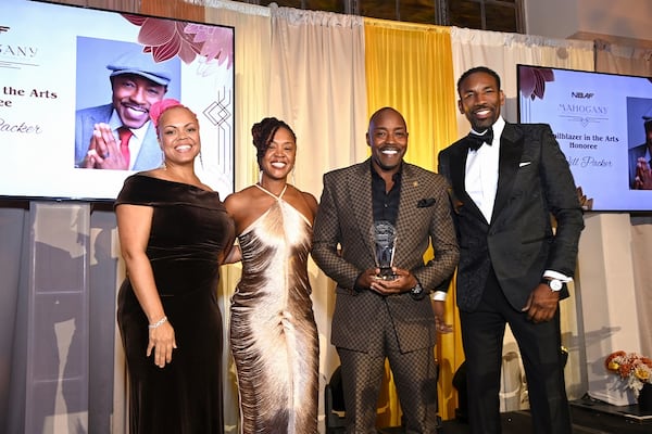 Oronike Odeleye (from left), Stephanie Owens, Will Packer and Mayor Andre Dickens attended the National Black Arts Festival in 2023. (Courtesy of Kim Evans/National Black Arts Festival) 