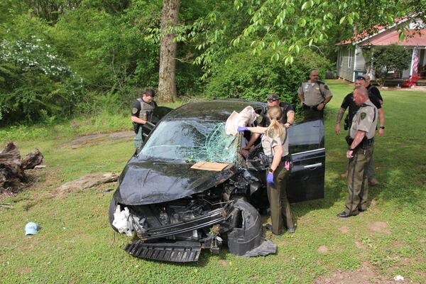 A Gilmer County deputy performed a pit maneuver on a black Nissan Sentra in Fannin County.