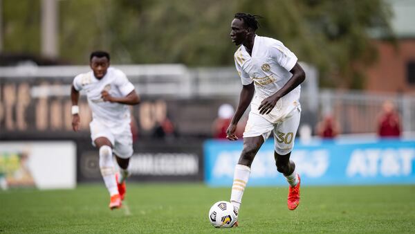 Atlanta United forward Machop Chol (30) dribbles the ball against Birmingham Legion FC during friendly match Sunday, March 28, 2021, at BBVA Field in Birmingham, Ala. (Jacob Gonzalez/Atlanta United)