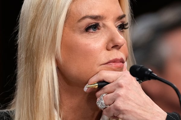 Pam Bondi, President-elect Donald Trump's choice to lead the Justice Department as attorney general, appears before the Senate Judiciary Committee for her confirmation hearing, at the Capitol in Washington, Wednesday, Jan. 15, 2025. (AP Photo/Ben Curtis)