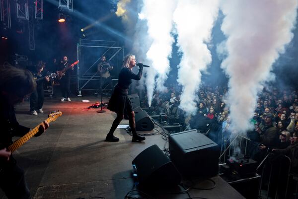 Indie rock band Renie Cares performs during the presentation of the music album Epoch, a collaboration between Ukrainian artists and the 3rd Assault Brigade, in Kyiv, Ukraine, Saturday, Dec. 7, 2024. (AP Photo/Alex Babenko)