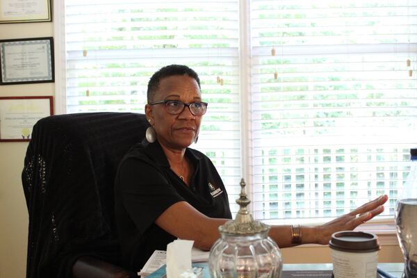 Barbara Johnson, the director of Rainbow Housing Assistance Corporation at Caswyk Trail, was grateful for all the volunteers who helped prepare back-to-school back packs for children at the Marietta housing complex that her nonprofit serves.