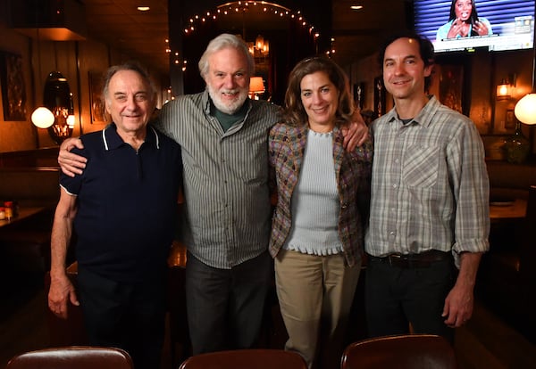 Charlie Pero (left) and his son Billy (far right) are seen with longtime customers Rick Salcedo and Mary Jo Sullivan. Sullivan has been coming to Pero's Pizza & Pasta for 50-plus years and had her 9th birthday party there. Chris Hunt for The Atlanta Journal-Constitution