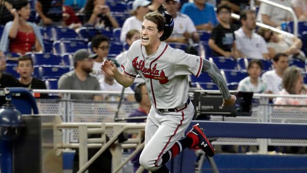 Atlanta Braves' Max Fried runs home to score on a double hit by Ender Inciarte during the tenth inning against the Miami Marlins, Sunday, May 5, 2019, in Miami. The Braves won 3-1 in ten innings. (Lynne Sladky/AP)