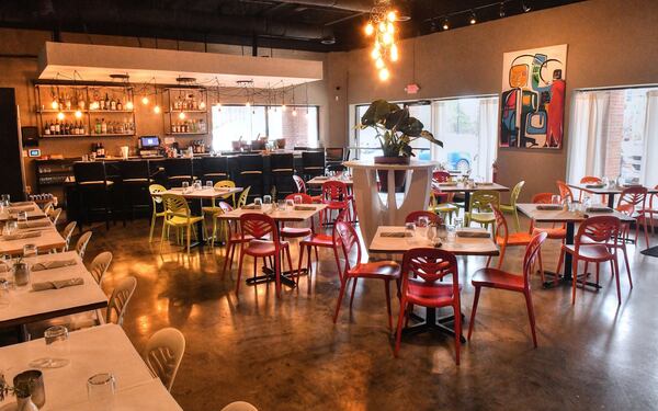 Jimmy'z interior, dining room with bar in background. (Contributed by Chris Hunt Photography)