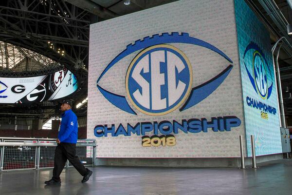 S.A.F.E. security officer Eddie Clark surveys the 200 level of Mercedes Benz Stadium a day before the SEC Championship football game in Atlanta on Friday.