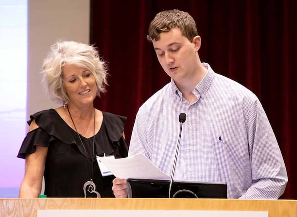 Clark Jacobs, right, and his mother, Mariellen, shared his story with Shepherd Center board members earlier this year.