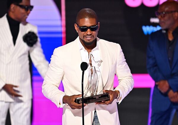 Honoree Usher accepts the Lifetime Achievement Award onstage during the 2024 BET Awards at Peacock Theater on June 30, 2024, in Los Angeles, California. (Paras Griffin/Getty Images for BET/TNS)