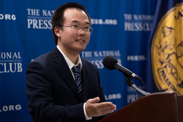 Dong Yifu, the son of imprisoned Chinese veteran journalist Dong Yuyu who was sentenced to seven years in prison on espionage charges, speaks about his father's detention to the National Press Club in Washington, Monday, Feb. 24, 2025. (AP Photo/Ben Curtis)