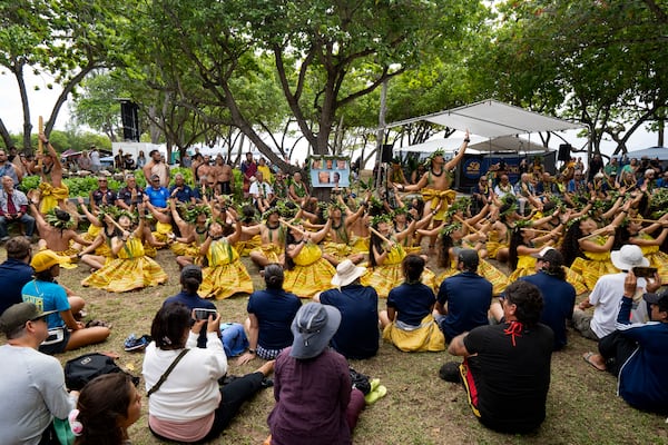 Kamehameha Schools Hawaiian Ensemble dancers perform during Hokulea's 50th birthday commemoration at Kualoa Regional Park, Saturday, March 8, 2025, in Kaneohe, Hawaii. (AP Photo/Mengshin Lin)