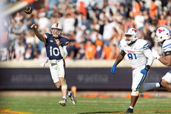 Virginia quarterback Anthony Colandrea (10) makes a pass against Southern Methodist during the first half of an NCAA college football game, Saturday, Nov. 23, 2024, in Charlottesville, Va. (AP Photo/Mike Kropf)