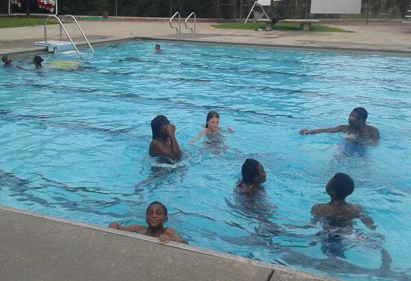 Young people play in the pool at Daffin Park.