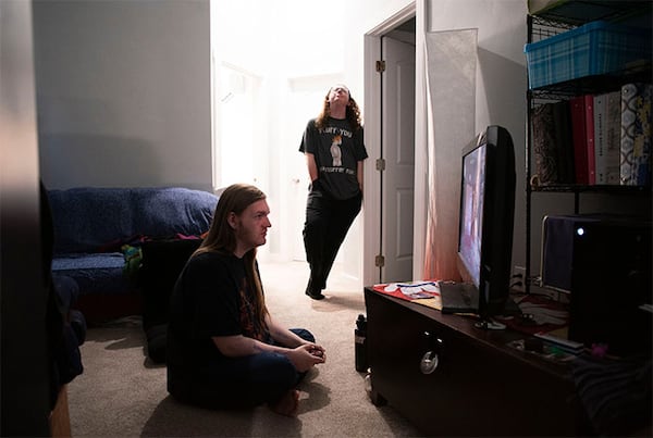 Shawn Whinery, left, and Wesley Ince relax at the Ince family home after their last day of school in Ontario. (Courtesy of Beth Nakamura / The Oregonian)