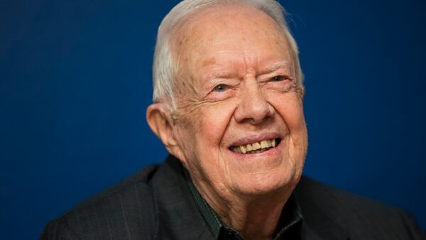 Former U.S. President Jimmy Carter smiles during a book signing event for his new book 'Faith: A Journey For All' at Barnes & Noble bookstore in Midtown Manhattan, March 26, 2018 in New York City. (Photo by Drew Angerer/Getty Images)