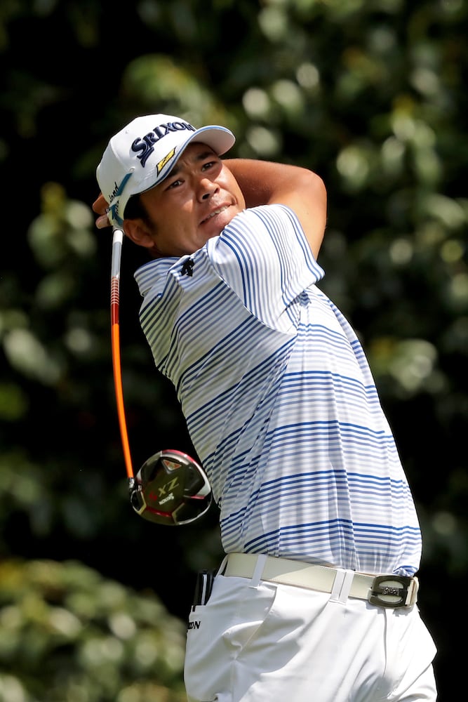 April 8, 2021, Augusta: Hideki Matsuyama hits his tee shot on the eleventh hole during the first round of the Masters at Augusta National Golf Club on Thursday, April 8, 2021, in Augusta. Curtis Compton/ccompton@ajc.com