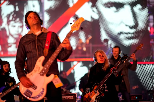 Musicians play on the stage during the concert for freedom for the 35th anniversary of the fall of the Berlin Wall, at the Brandenburg Gate in Berlin, Germany, Saturday, Nov. 9, 2024. (AP Photo/Ebrahim Noroozi)