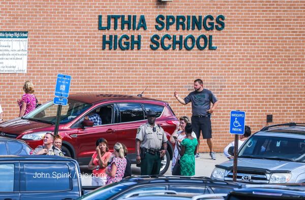 Classes were canceled Thursday at Lithia Springs High School after a veteran teacher shot himself inside his classroom. JOHN SPINK / JSPINK@AJC.COM