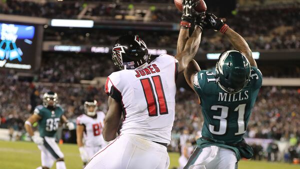 Eagles cornerback Jalen Mills defends against Falcons wide receiver Julio Jones breaking up a pass to the end zone during in the NFC Divisional Playoff Game Jan. 13, 2018, in Philadelphia.