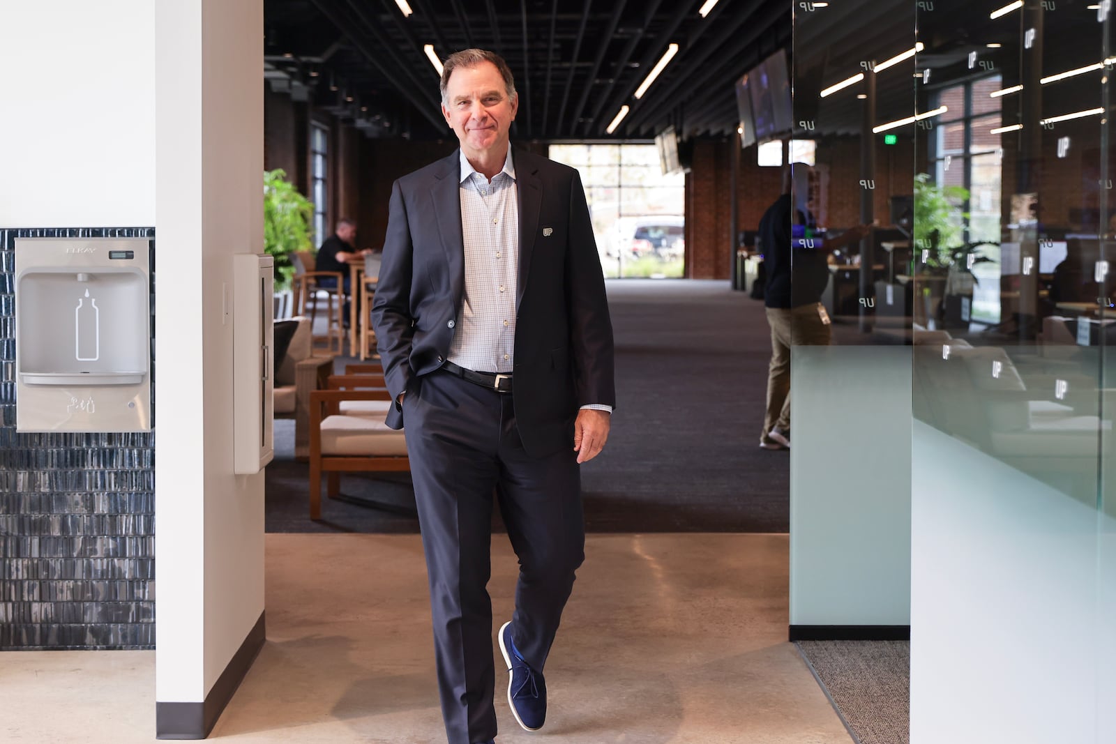 Wheels Up CEO George Mattson poses for a photo on Wednesday, Nov. 15, 2023. The private jet company that is a partner to Delta Air Lines relocated its member operations from Ohio to the 34,000-square-foot facility in Atlanta. (Natrice Miller/ Natrice.miller@ajc.com)